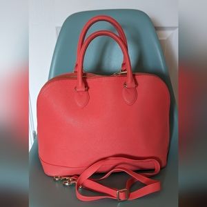 Danier leather handbag in corral - medium size